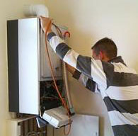 a professional tech from our Wylie plumbers company is repairing a water heater